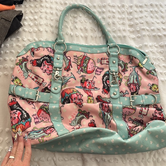 Iron Fist Pink and Blue Travel Bags with Whimsical Design - Picture 4 of 5